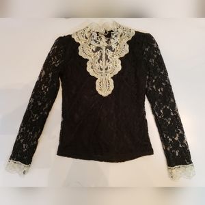 Black and Cream lace top made to look vintage. With faux pearl detailing.